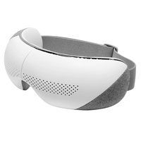 Masseur oculaire intelligent en graphène avec musique Bluetooth 4 modes de compression Airbag Batterie 1200mAh pour la relaxation au bureau et les soins des yeux