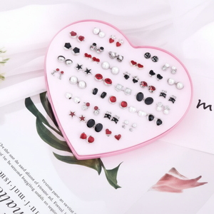 Orecchini Huggie gotici fatti a mano di moda gioielli di strass con perle incrociate per ragazze vendita all'ingrosso - Product Image 1