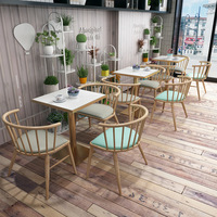 Ensemble table et chaises de salle à manger, design nordique, structure métallique, qualité commerciale, durable pour les meubles de restaurant