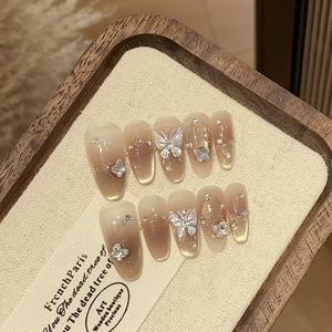 Nuevo francés Press-On ABS Uñas postizas Lote al por mayor de moda con pajarita Diseño de diamantes de imitación de <span class=keywords><strong>nieve</strong></span> para los dedos Producto de belleza - Product Image 2
