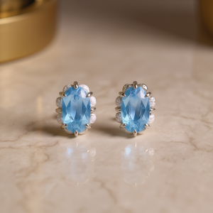 Orecchini a perno E4625 con gemma blu cielo taglio ovale, montatura a griffe in oro bianco, classici da donna per tutti i giorni - Product Image 2