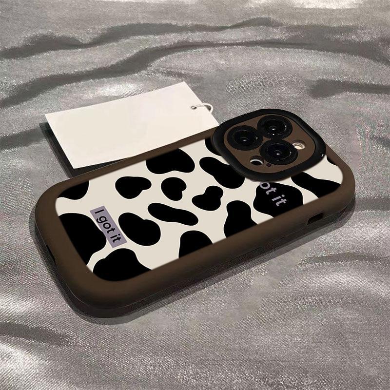 Puff coquillage-marron-noir et blanc motif vache