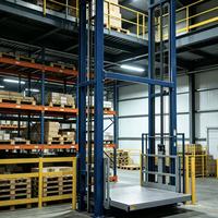 Plateforme élévatrice hydraulique verticale pour marchandises, avec rail de guidage fixe, pour le chargement et le déchargement en entrepôt