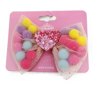 Großhandel Kinder Plüsch Ball Organza Bowknot Glitter Liebe Herz Haars pangen für Mädchen