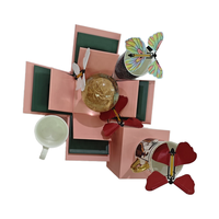 Boîte cadeau papillon volant surprise avec bougie, gâteau, fleurs et couches surprise, boîte cadeau papillon volant