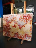 Dalle d'onyx rouge translucide de luxe, marbre de jade pour mur de fond de villa et comptoir