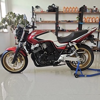 Moto de rue Honda CB400 d'occasion, essence, 400 cm³, refroidissement liquide, 4 cylindres en ligne, haute performance