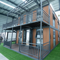 Maison conteneur extensible à double aile de 20 pieds, aspect bois, certifiée CE, pour l'hébergement des travailleurs