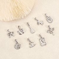 Bijoux rétro élégants à bricoler soi-même en acier inoxydable 316L or 18K nœud papillon jupe fleur rose pendentif violon accessoires de mode pour femmes
