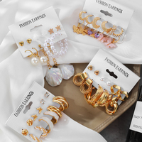 Nouvel ensemble de boucles d'oreilles créoles géométriques plaquées or tendance 2023 avec perles et pierres de cristal de luxe pour femme, idéal pour les soirées