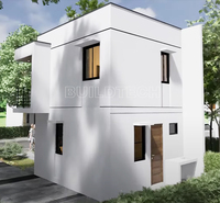Maison modulaire en conteneur à faible coût de 40 m², 2 chambres, murs blancs purs, 2 étages, aux Philippines