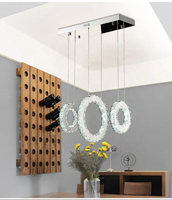 Lustre moderne en acier inoxydable chromé à hauteur réglable avec ampoules incandescentes pour salon, restaurant, bar et café