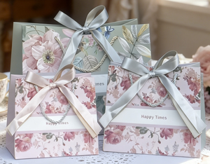 Sacs cadeaux en papier à imprimé floral avec nœud en ruban <span class=keywords><strong>de</strong></span> satin, sac fourre-tout rose <span class=keywords><strong>de</strong></span> luxe à fleurs, sacs d'emballage pour cadeaux d'anniversaire, <span class=keywords><strong>de</strong></span> professeur ou <span class=keywords><strong>de</strong></span> fête des Mères - Product Image 1