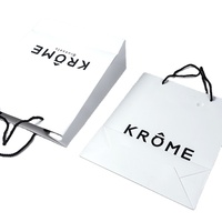 Sac de shopping et d'emballage cadeau en papier recyclable personnalisé avec votre propre logo, avec poignée découpée pour vêtements, pour boutique