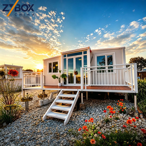Casa Contenedor Expandible Elevada ZYBOX de 20 pies, con Plataforma de Acero Totalmente Blanca, Prefabricada, Modular, para Parques de Vacaciones Costeros - Product Image 1