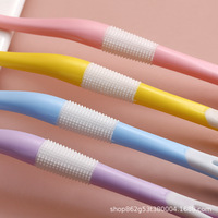 Brosse à dents et gratte-langue double effet en silicone à poils souples pour adulte