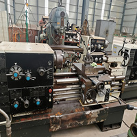 Tour horizontal universel manuel d'occasion, avec banc à interstice, pour le tournage de disques et d'arbres métalliques en atelier mécanique