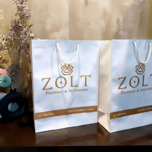 Luxury White <b>Paper</b> Shopping Bags with Custom Logo Black Rope Handles Recyclable Gift Packaging Bags for Corporate Branding - Product Image 1