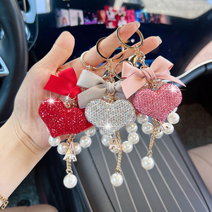 Porte-clés Pendentif Cœur Nœud Papillon Perle Diamant Pêche, Porte-clés de Voiture en Alliage Strass avec Chaîne de Perles pour Sac à Main - Product Image 5