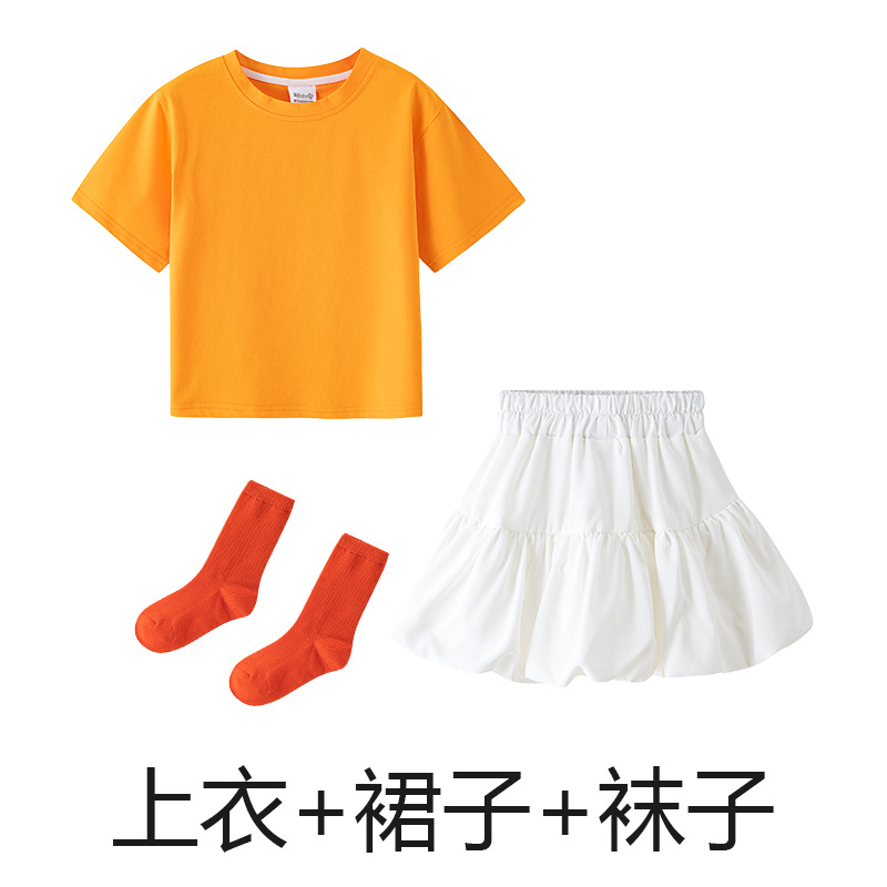 Orange T-shirt, white skirt, orange socks