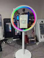 Borne photo miroir magique ronde populaire de 21,5 pouces avec écran tactile et impression instantanée, support métallique et flight case pour événements festifs
