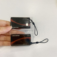 Muestra gratis personalizado impermeable 13,56 MHz Nfc epoxi etiqueta llaveros programables con cuerda negra