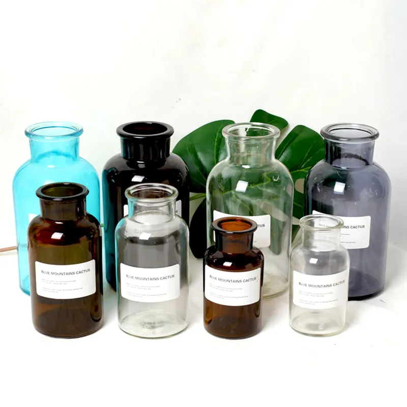 Commercio all'ingrosso più poco costoso cilindro in vetro soffiato vaso di colore alto mini vasi in vetro trasparente