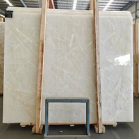 Marbre blanc naturel poli translucide de luxe pour tables basses, éviers, luminaires, escaliers et applications hôtelières