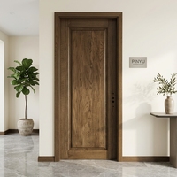 Armoire en bois massif avec cadre en laiton et verre cannelé vertical en noyer foncé, pour chambre, dressing, cuisine, ou comme porte intérieure de séparation.