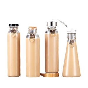 Bouteilles en verre transparent écologiques en gros avec bouchon à vis et impression sérigraphique, forme ronde, pour jus, eau, thé au lait - Product Image 2
