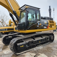 Excavatrice sur pneus d'occasion Caterpillar 330D2L de 30 tonnes avec godet de 1,5 m et puissance de 154 kW, en stock