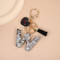 Porte-clés photo numérique de luxe avec pendentif cœur noir à sequins argentés en alliage premium et pompon, best-seller, breloque de sac