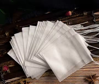 Sachet de thé vide jetable avec emballage de thé de fleur d'infuseur de thé de tissu non tissé de ficelles