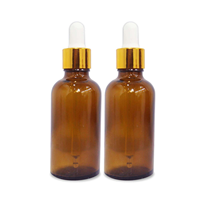 Flacon compte-gouttes en verre ambré 5ml-100ml avec bouchon doré et compte-gouttes blanc pour le stockage de sérum et d'huiles essentielles pour les soins de la peau