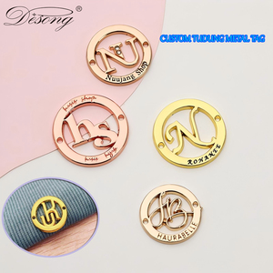 Round Metal Logo Tag Custom Sew on Clothing <b>Labels</b> for Garment Washable Wholesale Private Brand <b>Name</b> Metal Tags for Apparel - Product Image 1