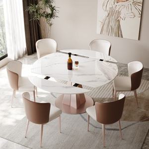 Table à manger ronde extensible moderne de haute qualité avec surface en pierre frittée et pieds en acier au carbone pour hôtel et villa - Product Image 1