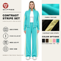 Ensemble deux pièces pour femme en polyester, style sportif, automne, coupe ajustée, veste sweat à capuche entièrement zippée à col montant et pantalon de survêtement