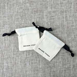 Sac à cordon en coton biologique personnalisable, écologique, recyclable, imprimé à l'écran, pour rouge à lèvres - Product Image 1