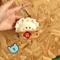 Meilleure vente en gros : Porte-clés créatif en peluche super douce en coton PP, en forme de boulette, avec doublure en maille, cadeau anti-stress Geely
