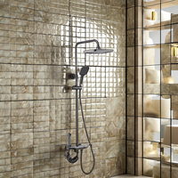 Robinet de douche à effet pluie en laiton haut de gamme pour hôtels, maison, conception murale avec quatre effets d'eau, jet de massage, clavier gris doux