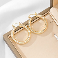 Vente en gros transfrontalière / Boucles d'oreilles pour femmes en cuivre texturé macramé doré, style décontracté/sportif, luxe léger, meilleures ventes