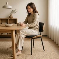 Chaise de salle à manger en métal rembourrée de style italien léger et luxueux pour hôtel et villa