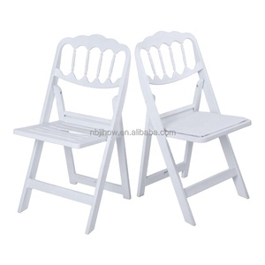 <span class=keywords><strong>Chaise</strong></span> <span class=keywords><strong>pliante</strong></span> en résine blanche rembourrée à dossier <span class=keywords><strong>Napoléon</strong></span> capacité de poids 850lbs pour événements - Product Image 1