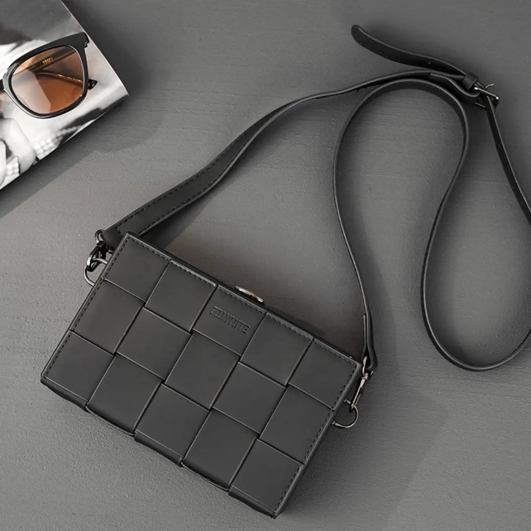 OEM ODM Fashionable and minimalist design women's Men's small square foreskin leather PU diagonal cross checkered handbag