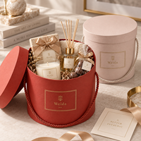 Boîte cadeau cylindrique rigide en carton texturé avec poignée en corde ronde, couvercle et base personnalisés avec logo, pour l'emballage de fleurs