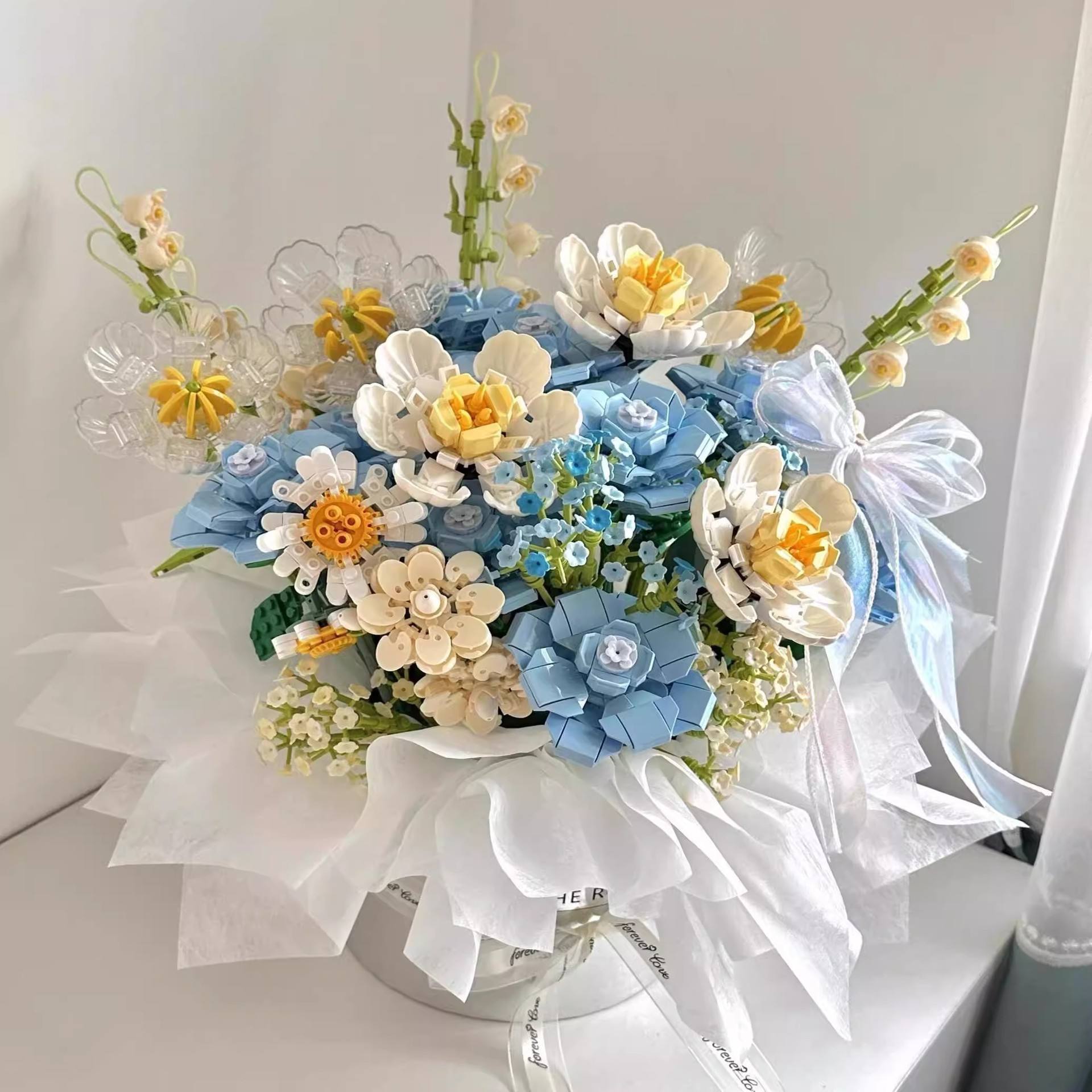 23 mixed flowers-bucket flower mud sydney paper ribbon glue