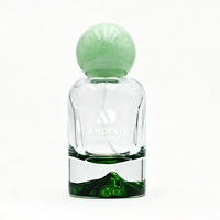 Flacon de parfum en verre vide cylindrique de 50 ml avec bouchon rond et col serti, personnalisable, vente en gros par Anding Supplier
