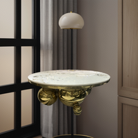 Table centrale ronde gigogne à cadre en métal doré avec dessus en pierre pour salon maison bar chambre appartement entrée supermarché