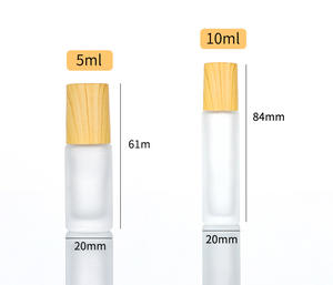 Vendita calda 5ml <span class=keywords><strong>10</strong></span> <span class=keywords><strong>ml</strong></span> rotolo di bottiglia di profumo smerigliato su bottiglia di vetro con tappo in legno coperchio a sfera in metallo per olio - Product Image 6