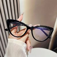 Lunettes de vue optiques tendance vintage 2025 avec logo personnalisé, lunettes de protection anti-lumière bleue colorées de style œil de chat pour femmes